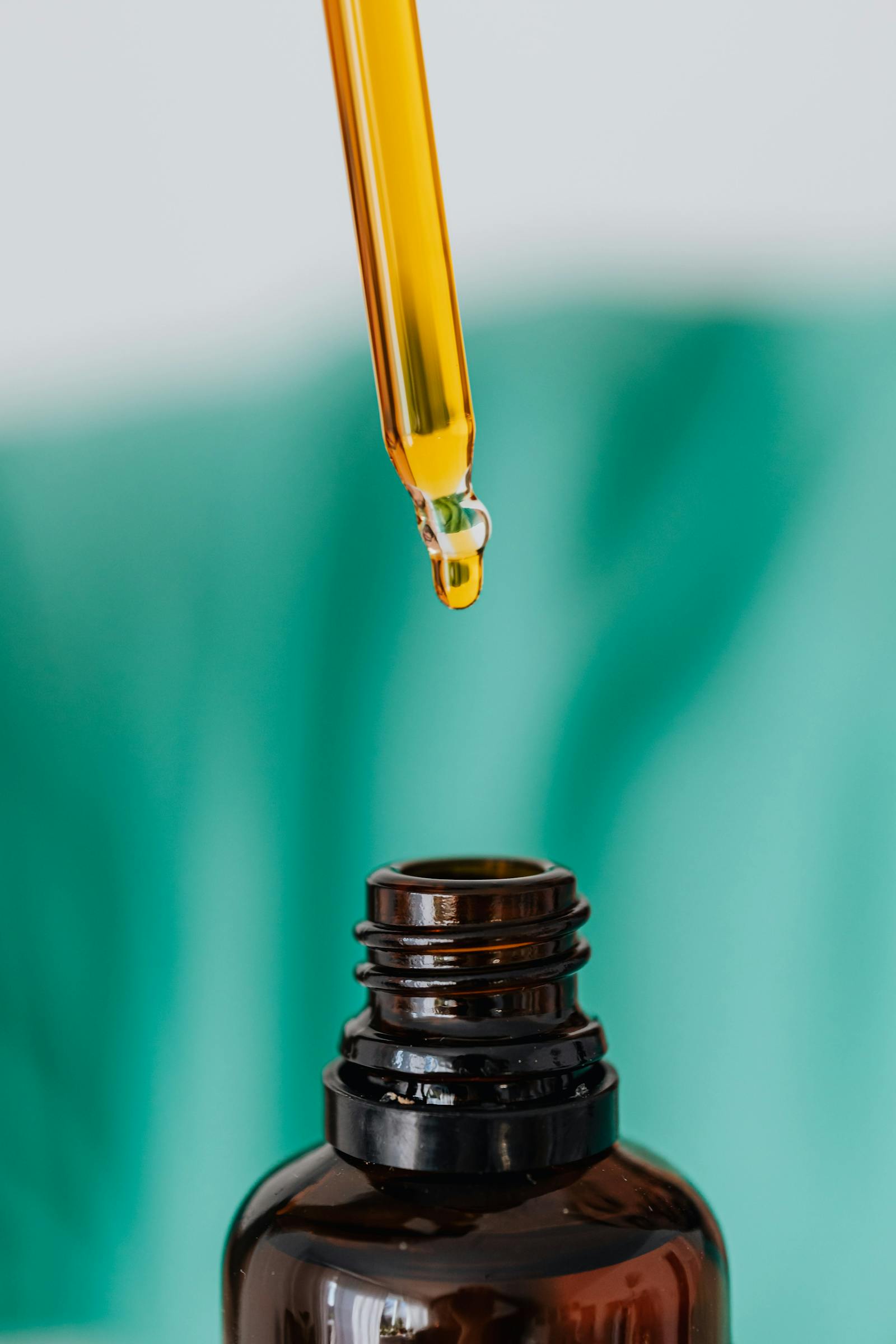 Laboratory pipette and amber bottle representing the scientific assessment behind EU Annex II prohibitions